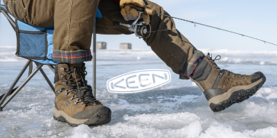 Man ice fishing in Keen winter boots