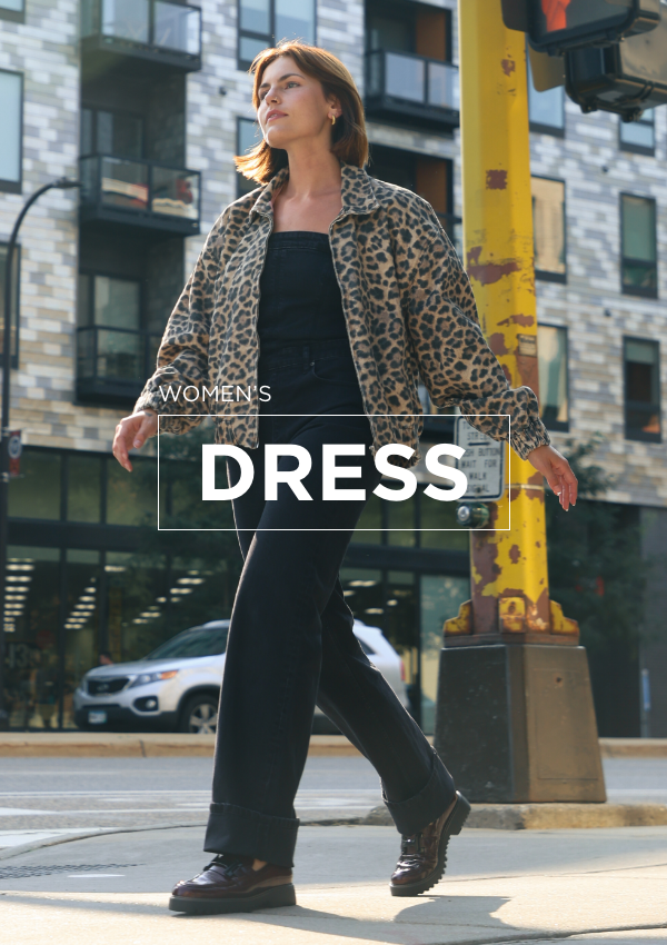 Woman walking across crosswalk in Pikolinos loafer