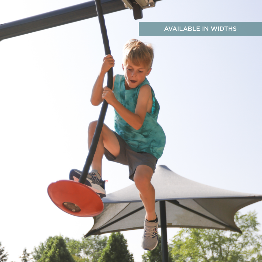 Kid jumping on to swing