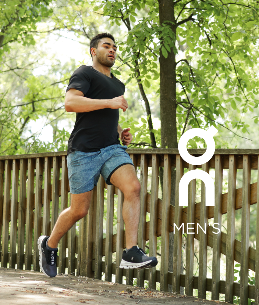Man running over bridge