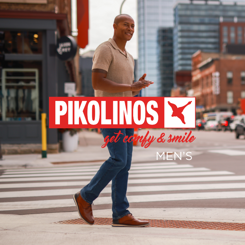 Man waiting to cross street downtown Minneapolis