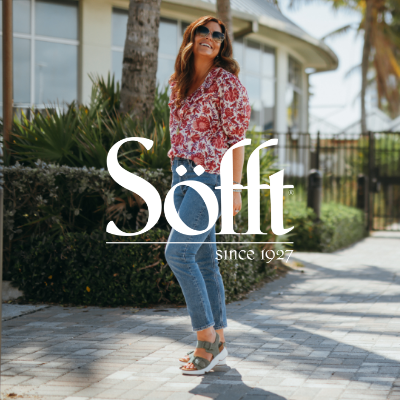Woman standing on sidewalk