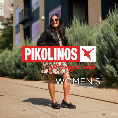 Woman standing on sidewalk