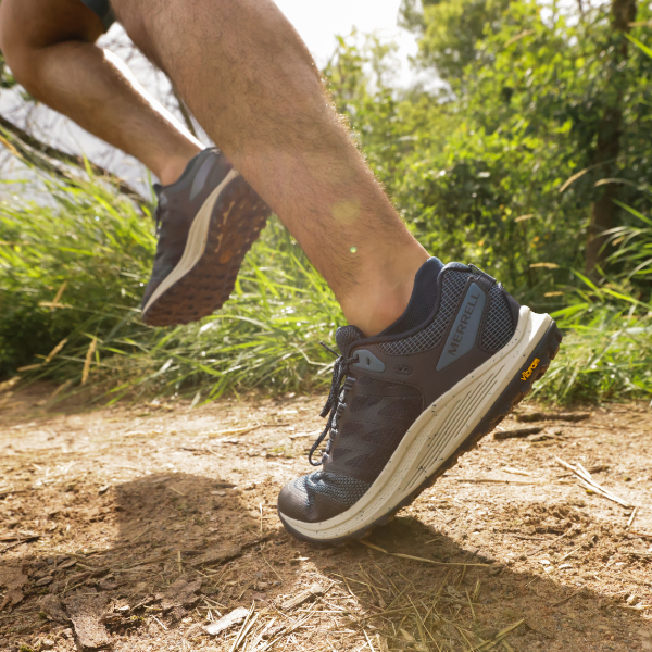 Man running on nature pathway