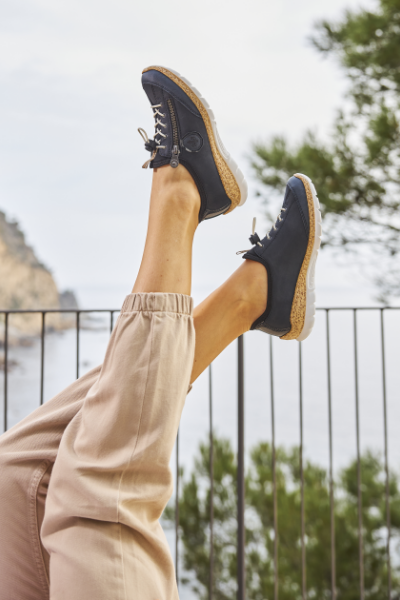 Woman putting feet in the air