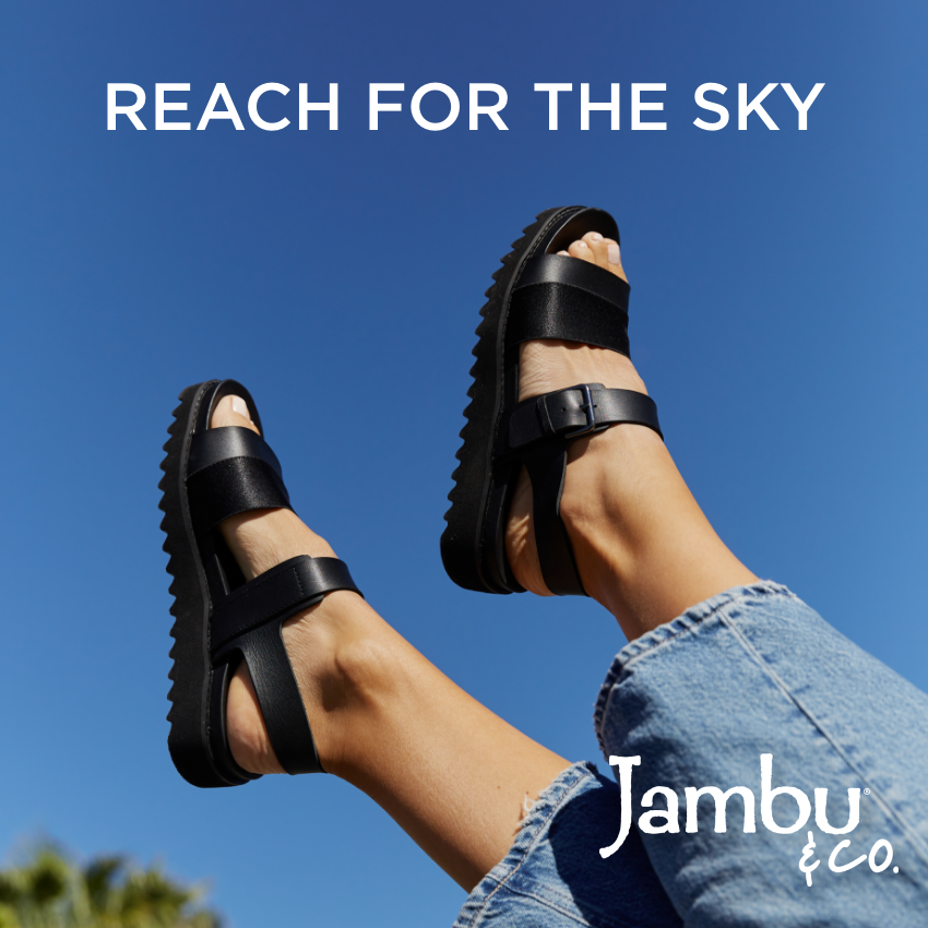 Woman raising feet in air