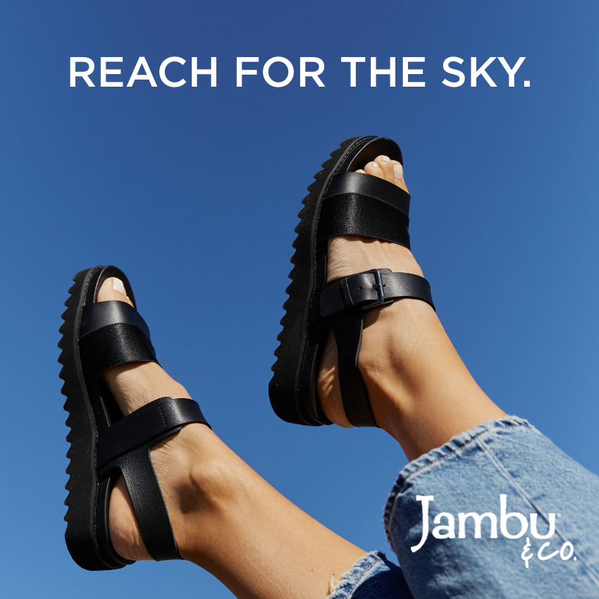 Woman raising feet in air