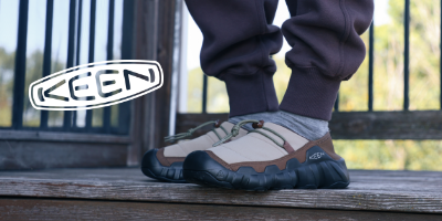 Man standing on porch stairs wearing Keen Hypowser Crushback slippers