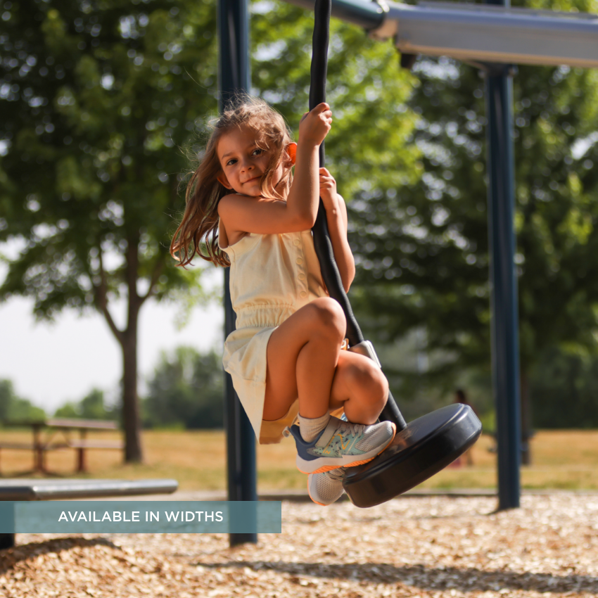 Kid hanging on to swing