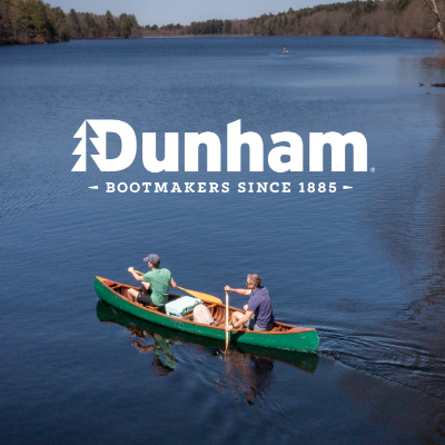 Men canoeing in lake