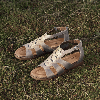 Shoes sitting in grass