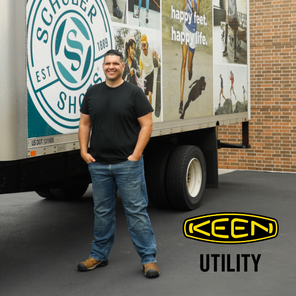 Jake standing in front of Schuler Shoes delivery truck 