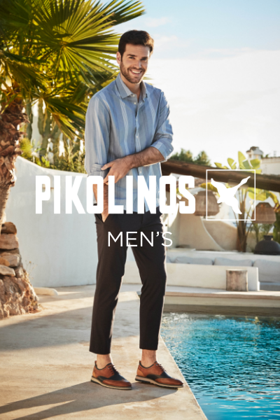Men standing next to pool