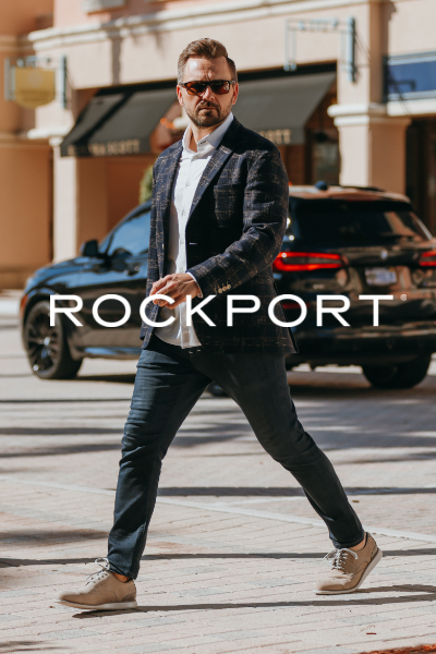 Man walking across road in business casual