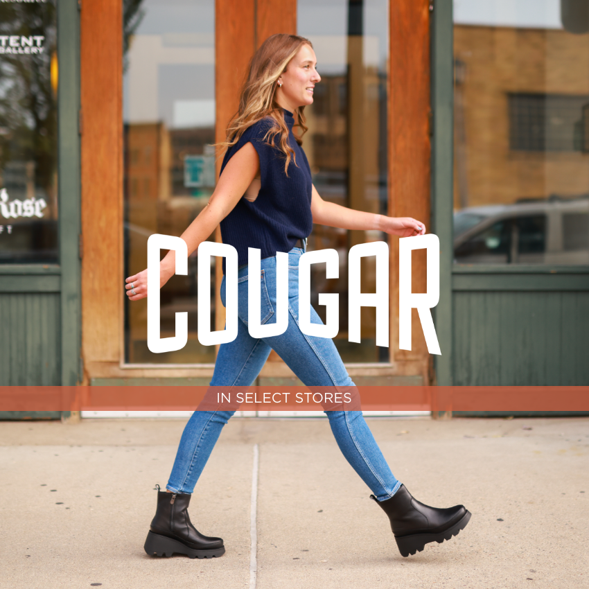Woman walking past door