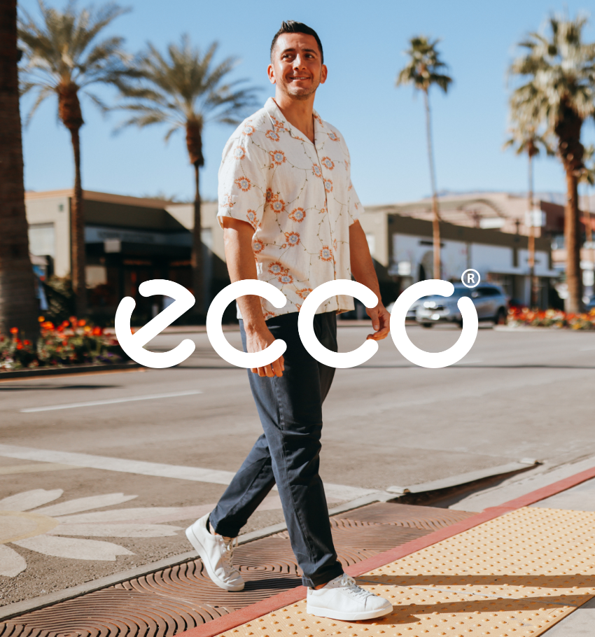 Man walking across crosswalk