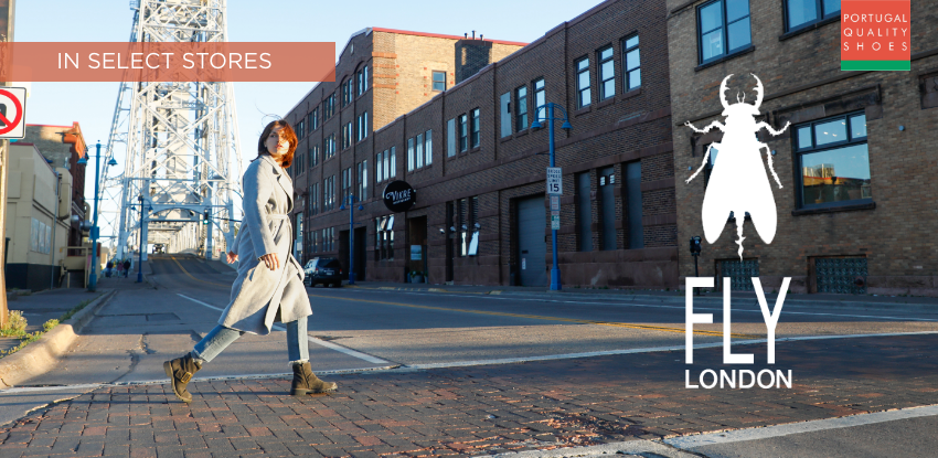 Woman walking across crosswalk in Duluth