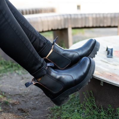 Woman setting feet on fire ring