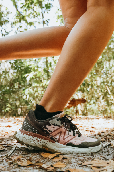 Woman running on trail