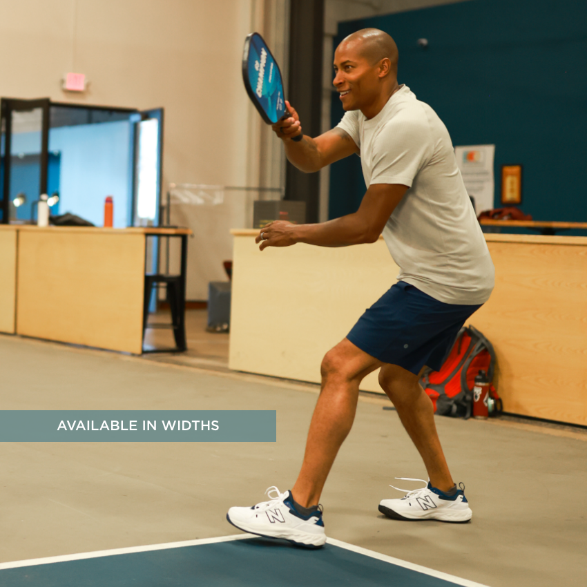 Man hitting pickleball