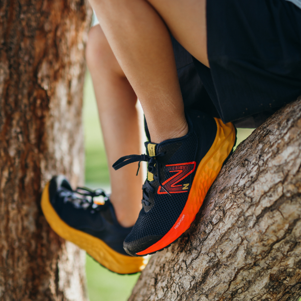 Kid climbing in tree