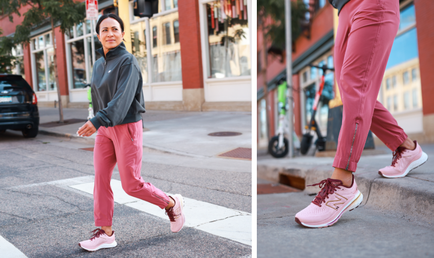 Woman walking across street on crosswalk