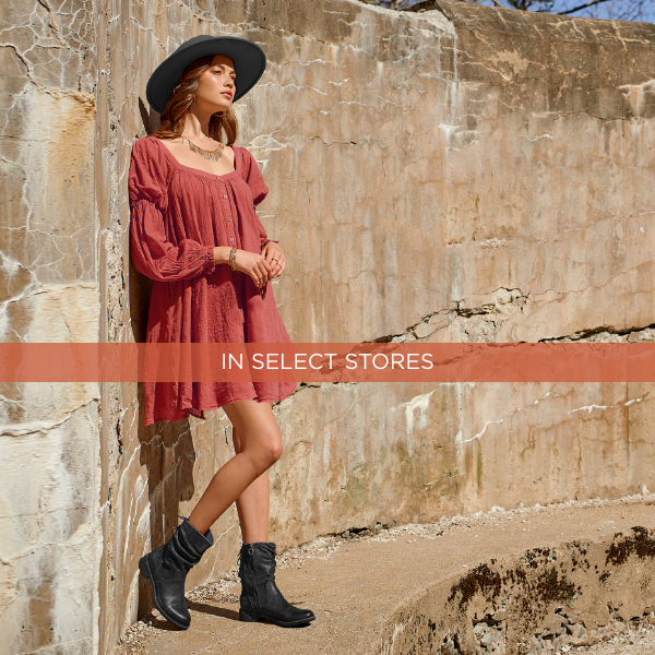 Woman leaning against wall