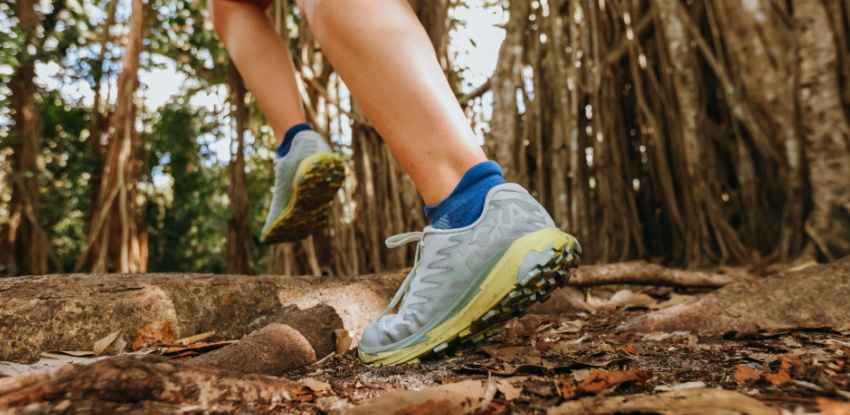 Woman running on trail