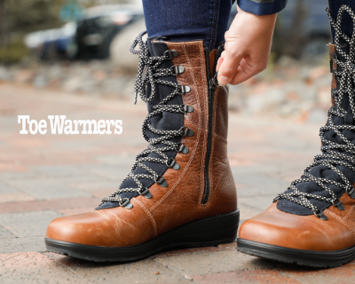 Woman zipping up Toe Warmers boots