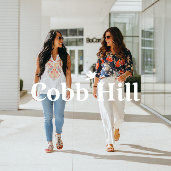 Women walking through outdoor shopping mall