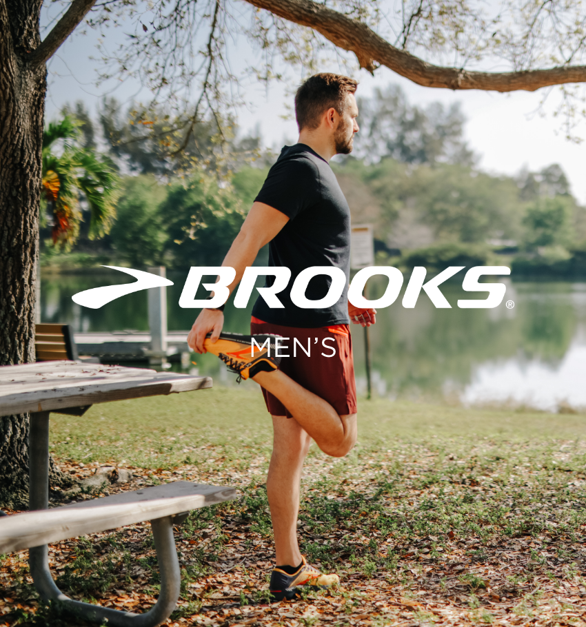 Man stretching in park