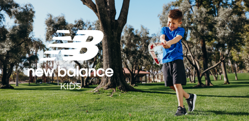 Boy throwing boomerang 