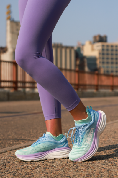 Woman standing on Stone Arch Bridge