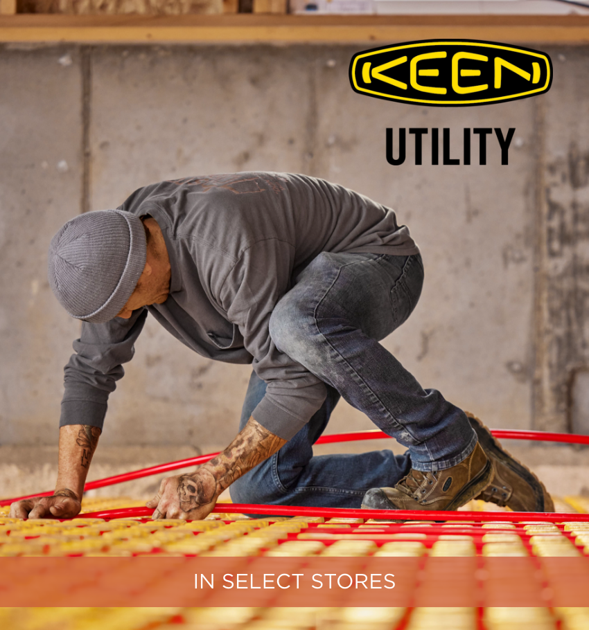 Man working on in floor heating 
