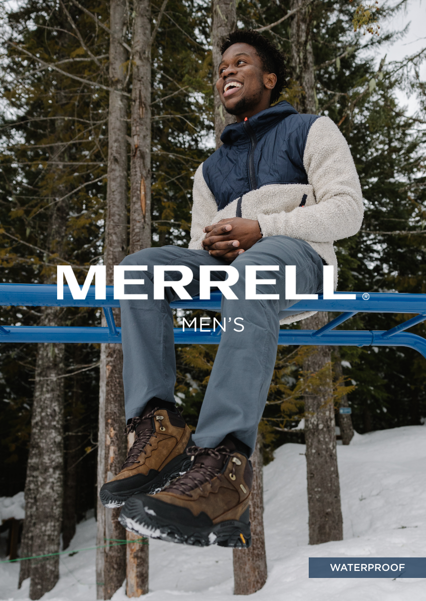 Man sitting on railing