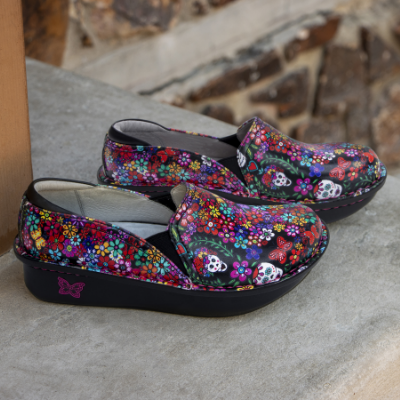 Alegria shoes sitting on stairs