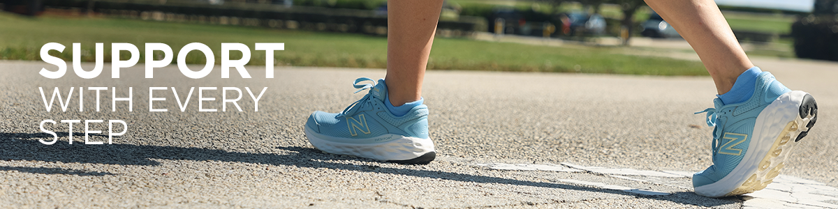 Woman walking on road wearing New Balance 840 walking shoes