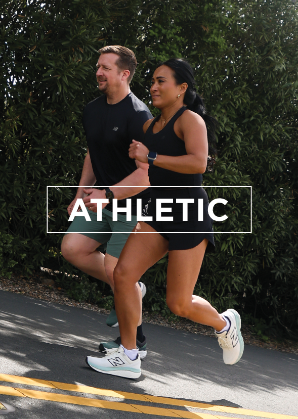 Couple running in a park wearing athletic shoes with overlay text "ATHLETIC"