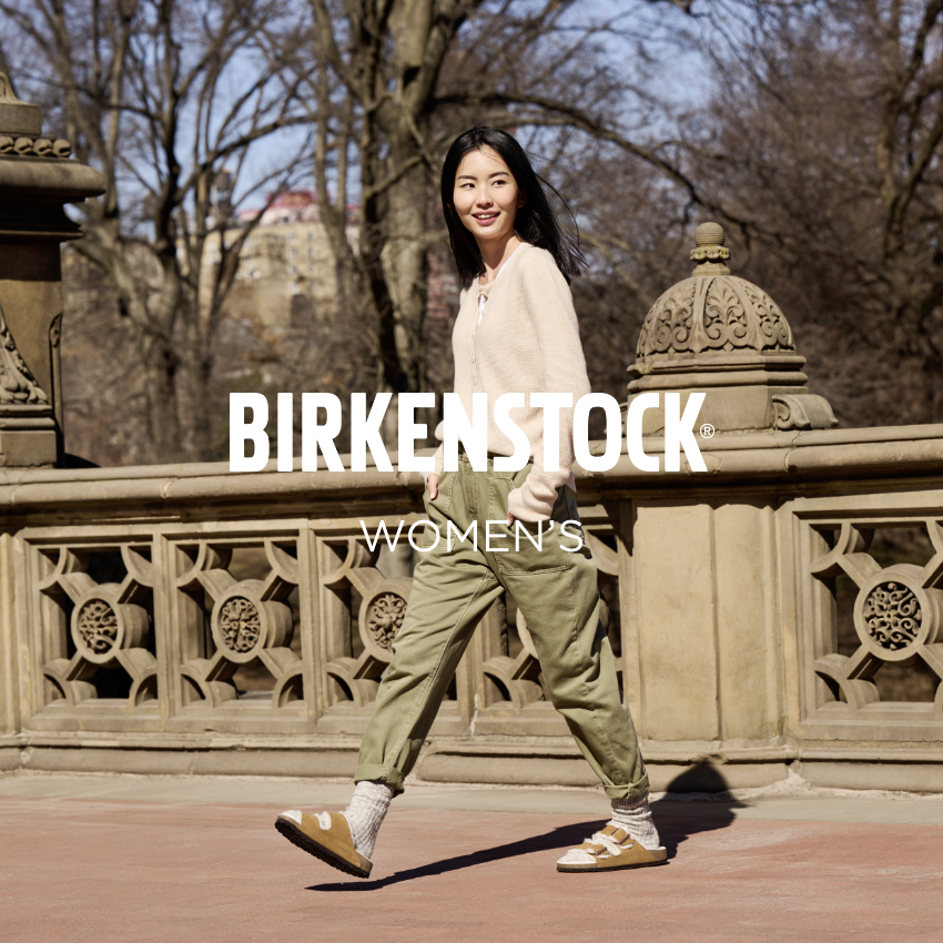 Woman walking towards camera in Birkenstock