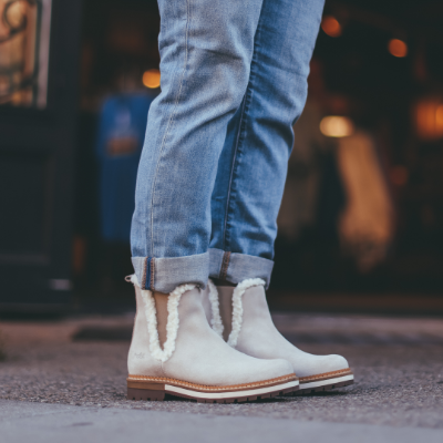 Woman standing on sidewalk