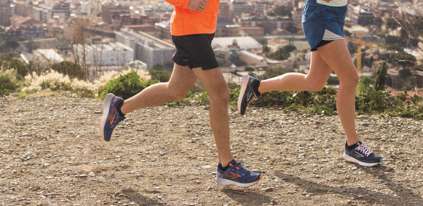 Man and woman running in sync 