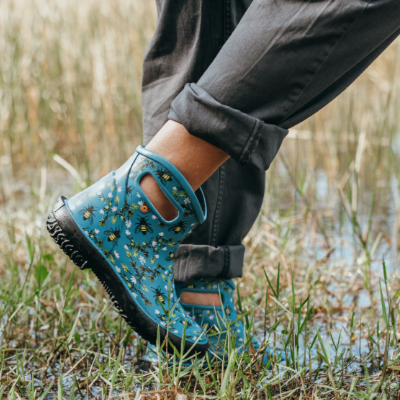 Woman walking through marsh