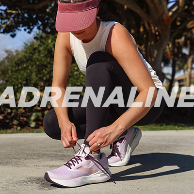 Woman wearing Brooks Adrenaline GTS 24 running shoes