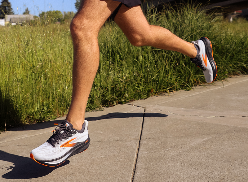 Man running outdoors in Brooks Ghost 17 running shoes