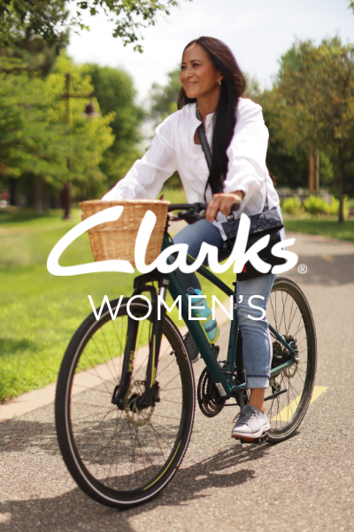 Women riding bike in Clarks shoe
