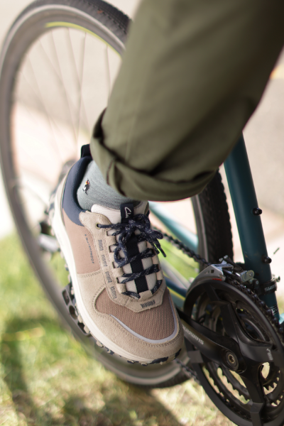 Man on bike with Clarks shoes