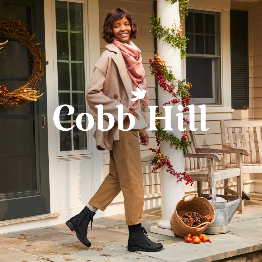 Woman walking across front porch