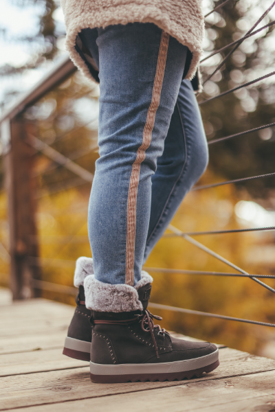 Woman standing on bridge