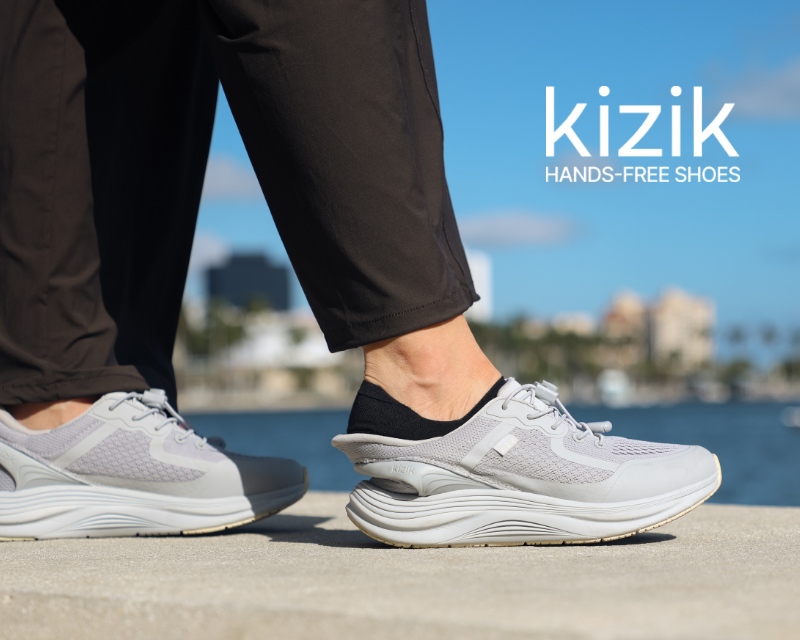 Woman stepping into Kizik hands free shoes