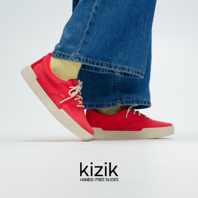 Kizik sneakers posed on white background